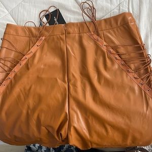 Beige/Camel pretty little things pleather pants. Size 16 super cute.